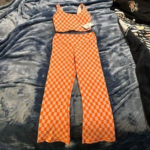 Houndstooth crop top and crop flares. Top has not been worn. Pants worn once.